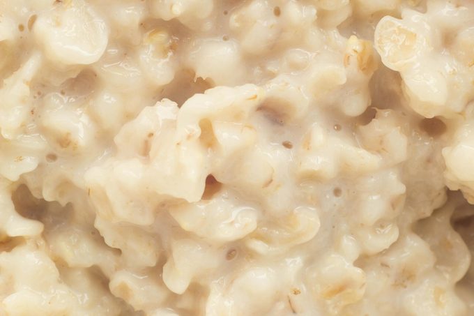 Boiled oat porridge, macro photography