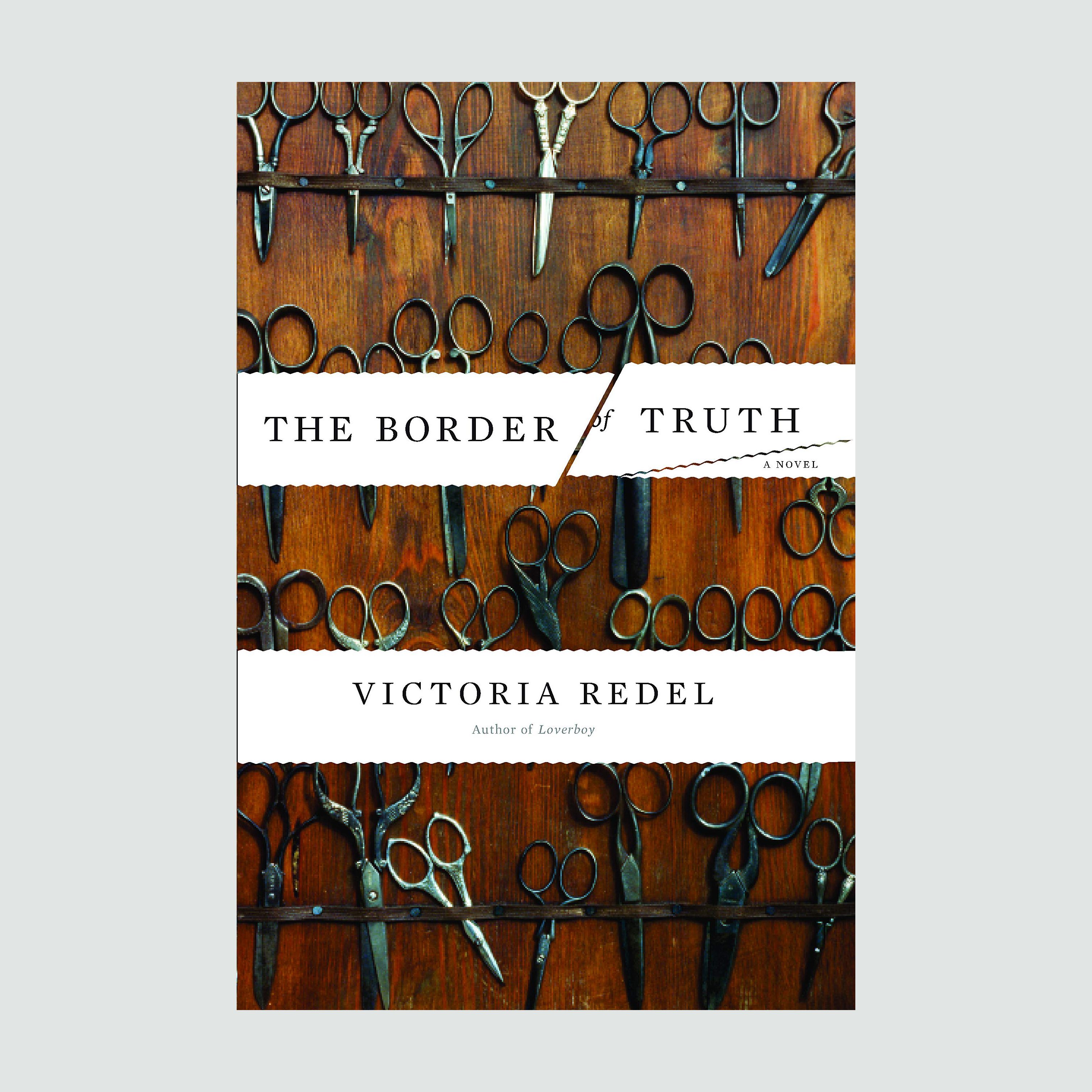 Scissors are arranged horizontally on a wooden surface. The text reads, "The Border of Truth, A Novel, Victoria Redel, Author of Loverboy."