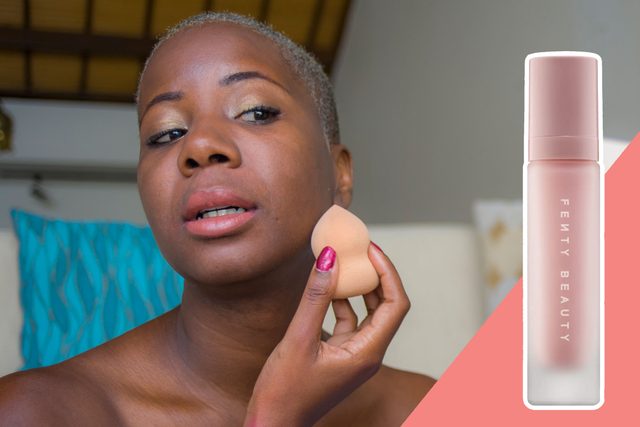 Person applies makeup with a sponge in a room; text reads 