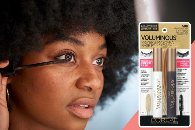 Woman applies mascara, focusing on eyelashes. Packaging for L'Oreal Voluminous Primer and Mascara is featured beside her, highlighting an exclusive offer.