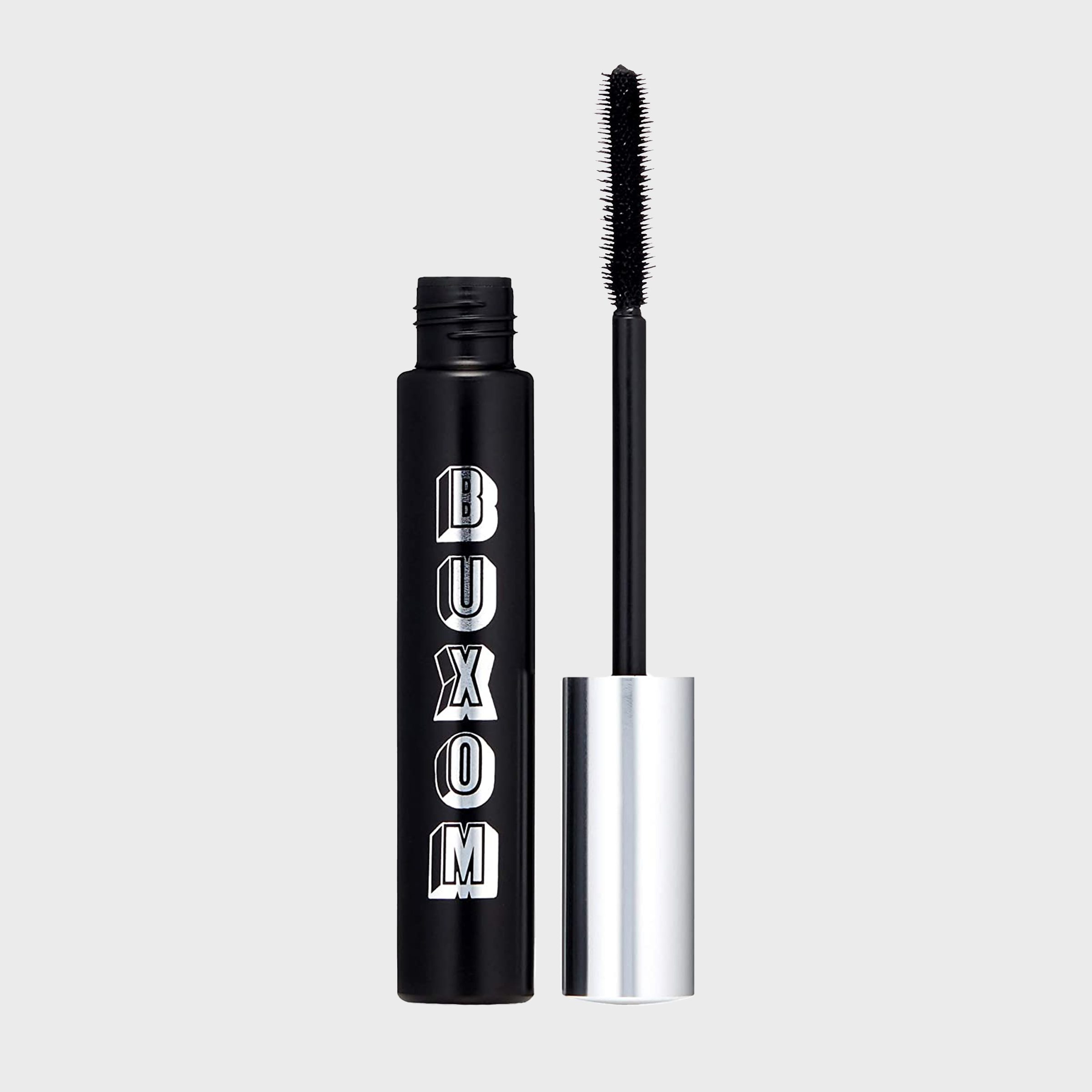 Mascara tube labeled "BUXOM," with the wand removed, standing against a plain background.