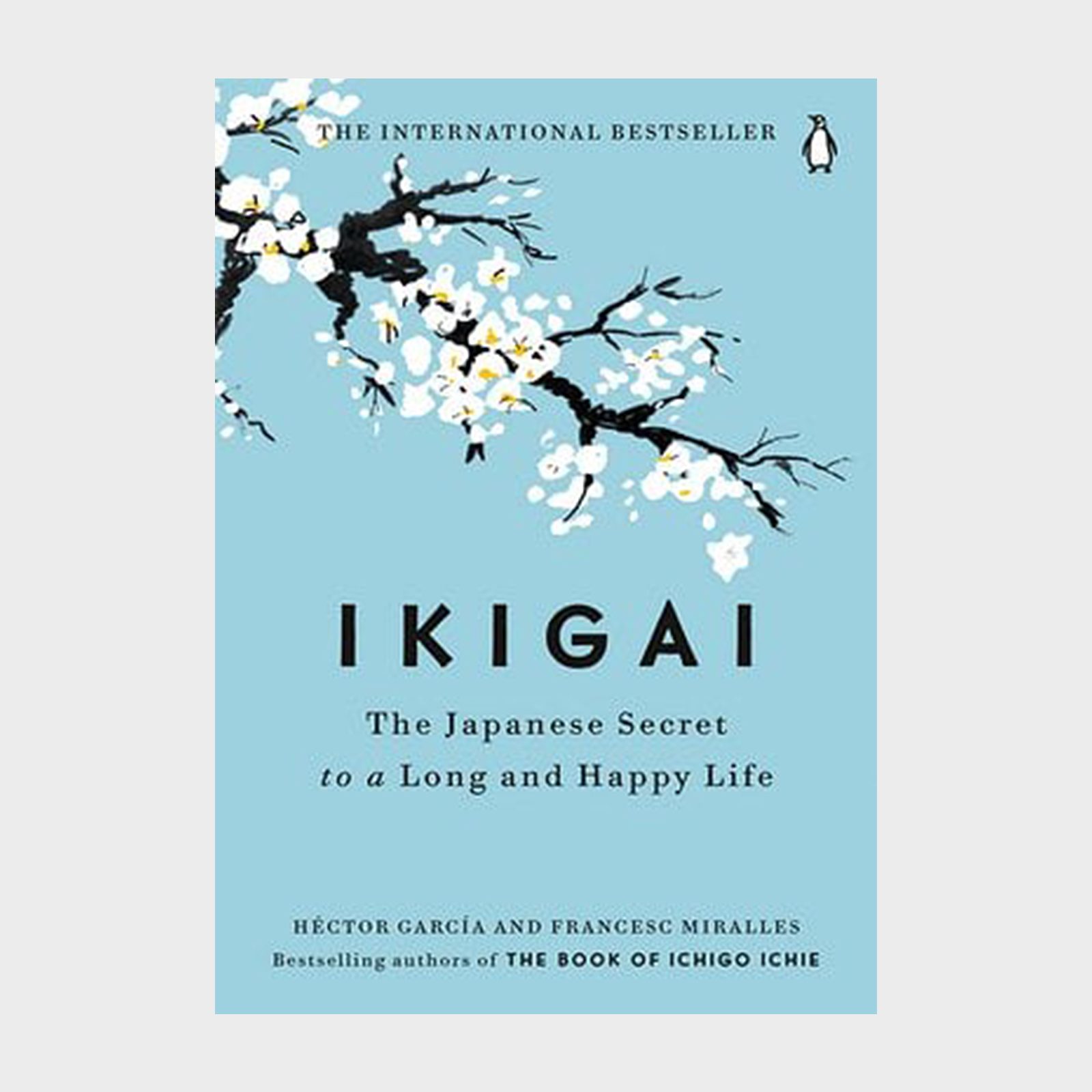 Book cover features cherry blossoms; text reads "IKIGAI: The Japanese Secret to a Long and Happy Life" by HÃ©ctor GarcÃ­a and Francesc Miralles. Blue background.