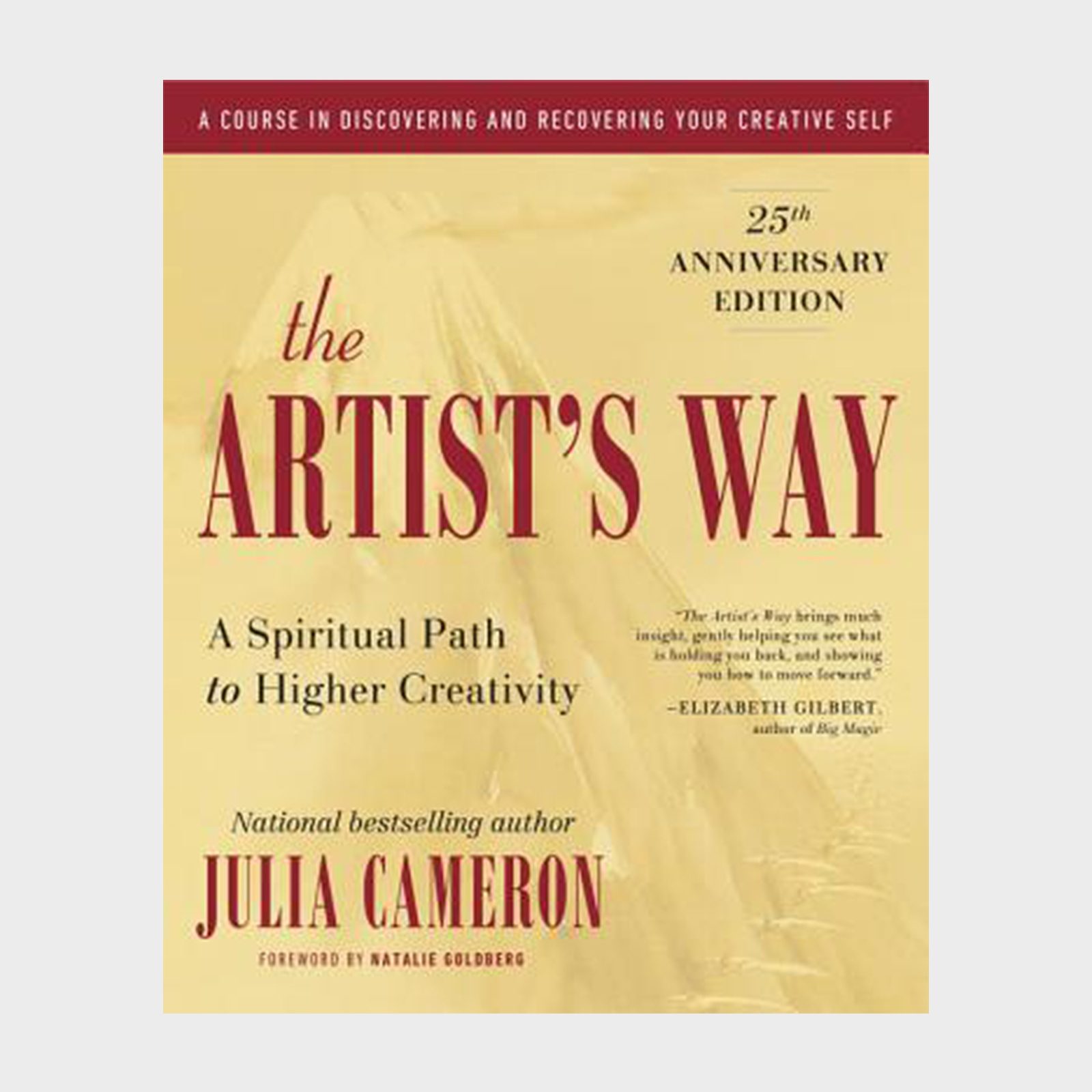 Book cover displays "The Artist's Way" text, featuring gold background with red title. Includes a testimonial and author information, celebrating the 25th anniversary edition.