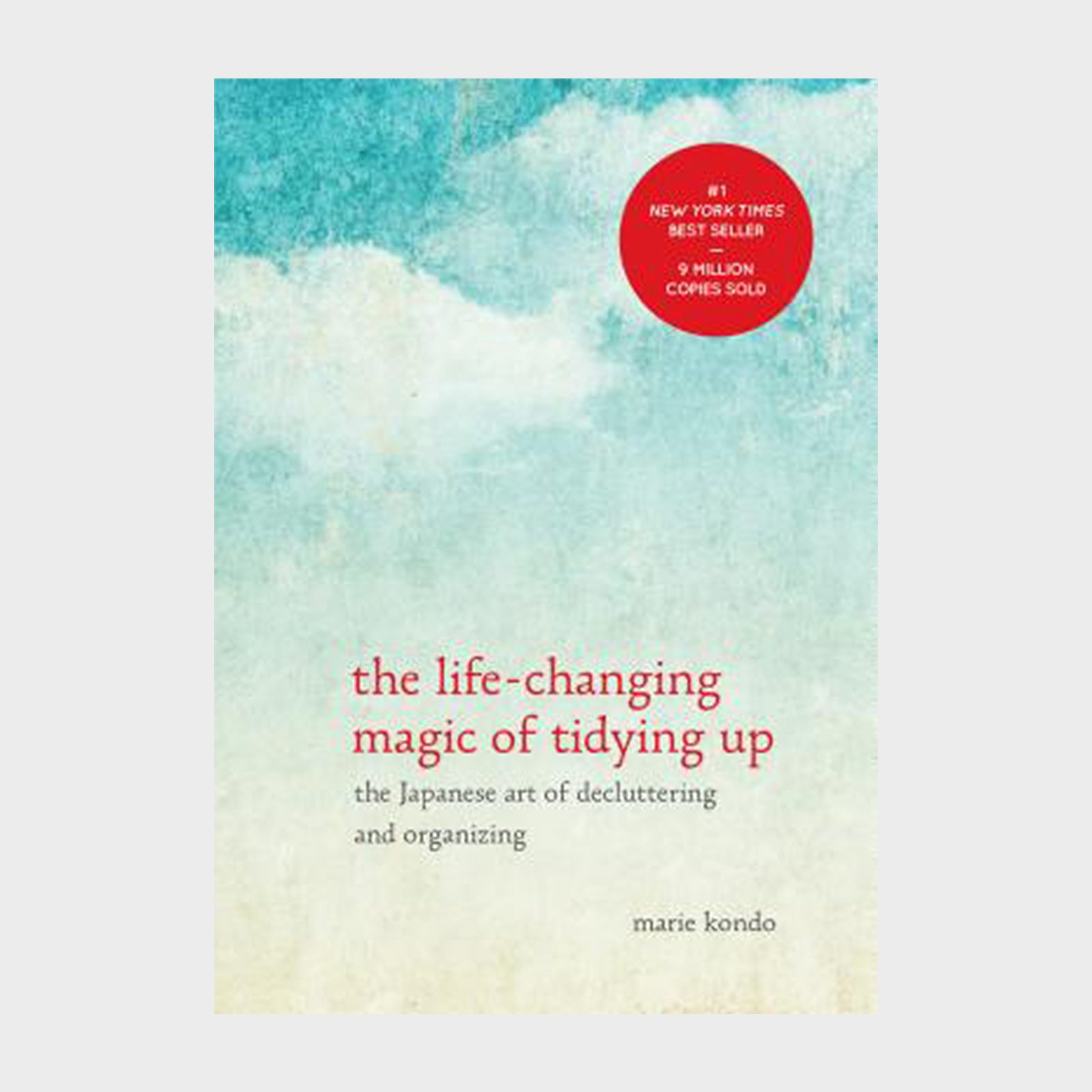 Book cover shows minimalist blue and white watercolor design with red text, "The Life-Changing Magic of Tidying Up" by Marie Kondo; bestseller label included.