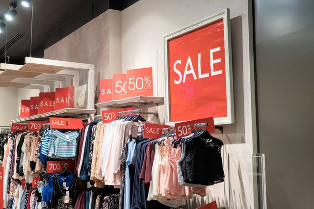 Sale label sign in front of shop,Sale shopping season for discount display,Sale marketing business advertisement for clearance shop,Sale sign or label most use red color for tell customer.