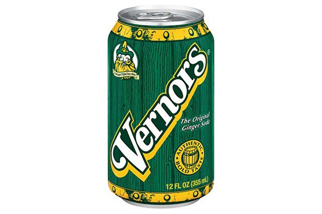 A can displays "Vernors," featuring green and yellow branding, labeled "The Original Ginger Soda," beside a gnome logo; holds 12 FL OZ (355 mL).