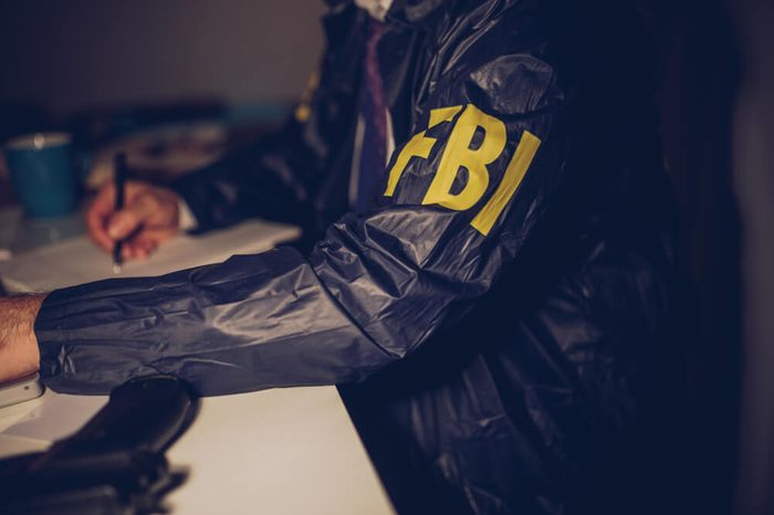 The FBI agent is working at night