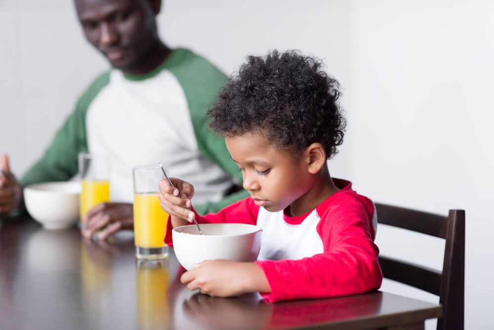 child eating cereal. April fools pranks