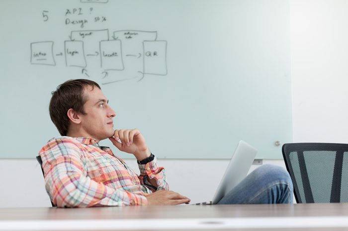 Business man thinking sitting office desk relaxing chair working place thoughtful businessman looking copy space