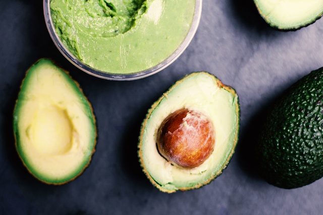 Halved avocados. Top view.  spread.  pasta. Guacamole 