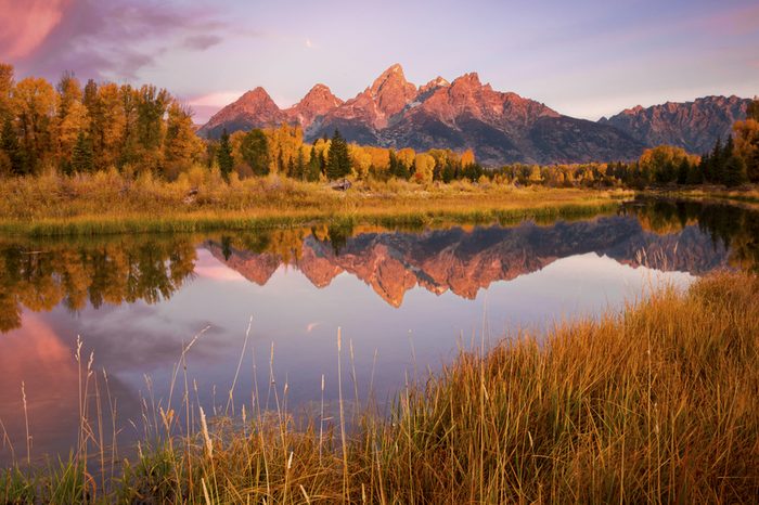 An autumn sunrise over Schwabacher's Landing in Grand Teton National Park, Wyoming. 