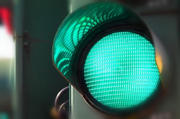 Close up view of green color on the traffic light.