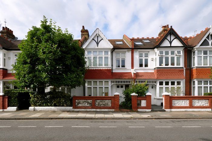 London street of early 20th century Edwardian terraced houses, without parked cars.
