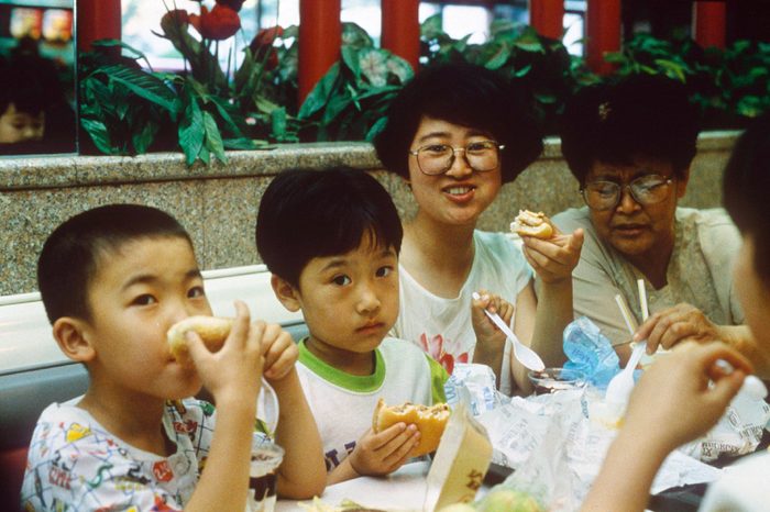 PEOPLE EATING AT MCDONALDS FAST FOOD RESTAURANT