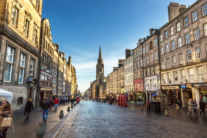 Edinburgh, Scotland - February 10th 2015 - Tourists and locals walking in the streets of downtown Edinburgh in Scotland.