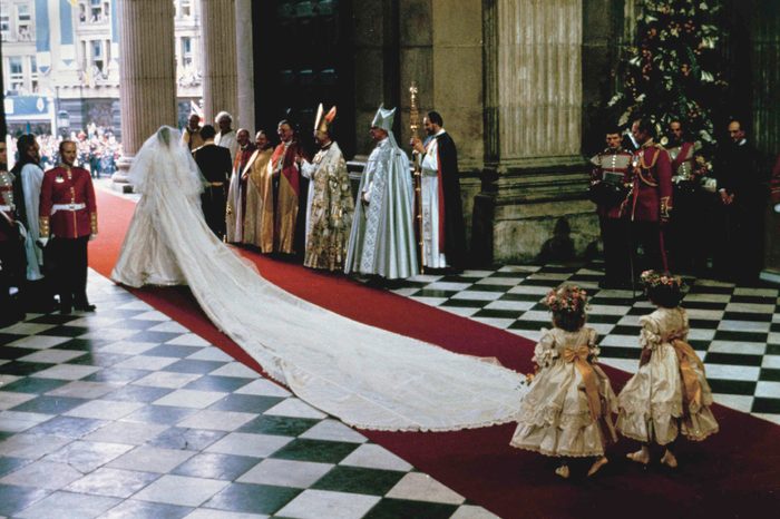 Prince Charles, Princess Diana With a 25-foot (7.6 meter) sweeping train, The Princess of Wales, former Lady Diana Spencer, leaves St. Paul's Cathedral arm in arm with Prince Charles at the end of their wedding ceremony in London