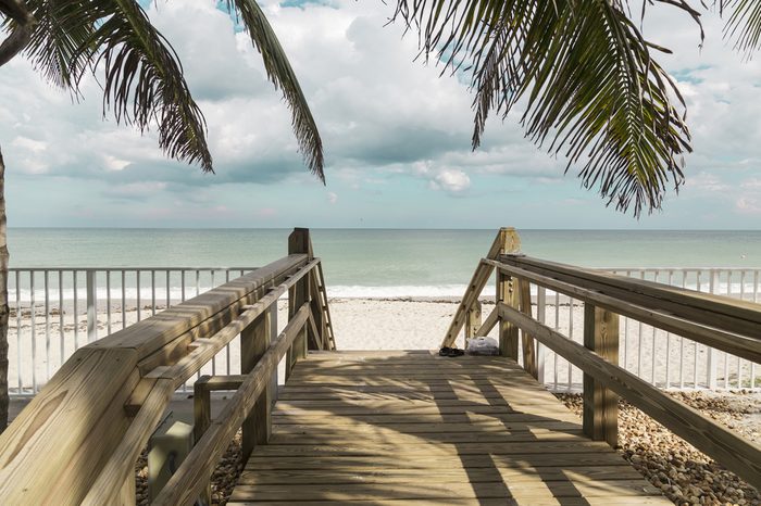 Wooden stairs on deserted beach dunes in Vero Beach, Florida