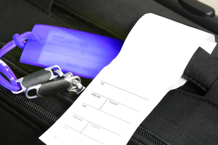 Traveling suitcase with checkin label (manual focus)