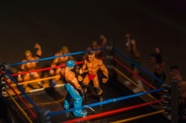 Wrestler Photograph of a toy masked mexican wrestler On the boxing stage