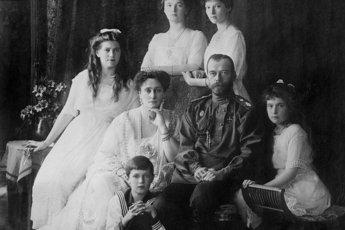 Russian Royal family in 1914. L-R Seated: Marie, Queen Alexandra, Czar Nicholas II, Anastasia, Alexei. Standing: Olga and Tatiana.