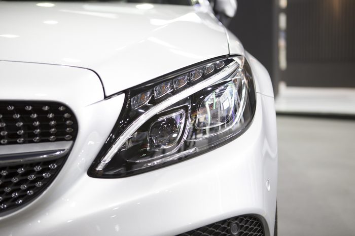 Closeup headlights of car left