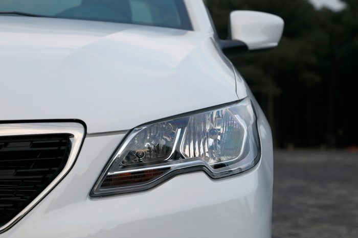 modern car headlight, car exterior detail.