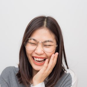 Laughing of asian beautiful positive thinking women with short hair on white background