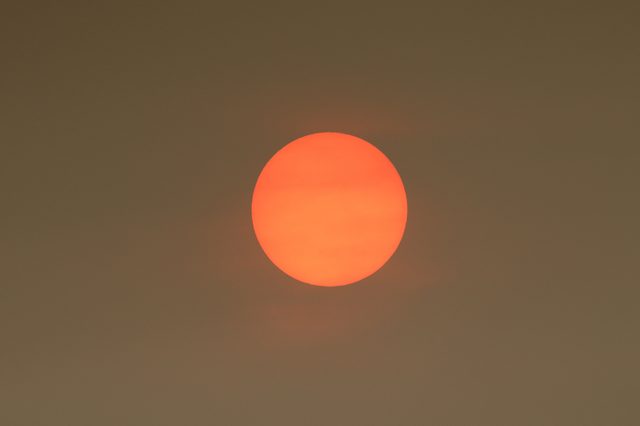 The Sun colour in the Uk was due to a weather phenomenon, Saharan dust, blown in by ex-hurricane Ophelia and also from debris, caused by fires in Portugal and Spain.