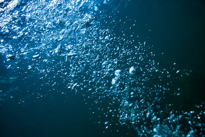 BUBBLING WATER BACKGROUND, STREAM OF BUBBLES