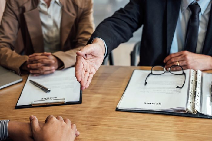 Welcome to colleagues, two senior manager shaking hands after during job interview, interview the job and hiring concept.