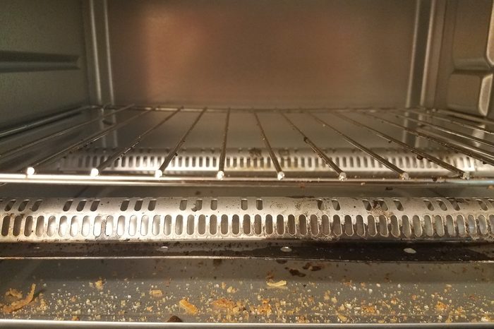inside a toaster oven with bread crumbs