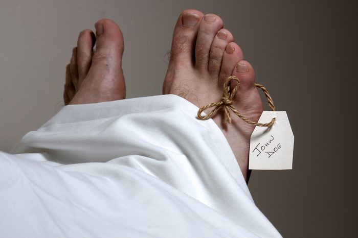 A John Doe name tag on the foot of a body