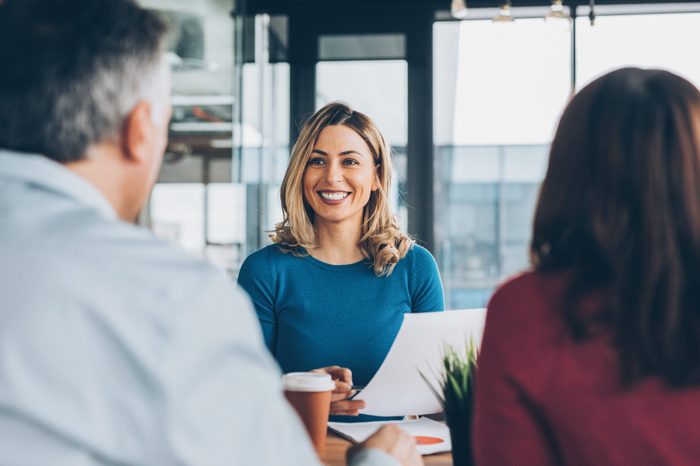 woman smiling across the table