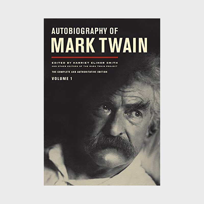 Book cover displaying Mark Twain's portrait looking upward, set against a dark background. Text reads: "Autobiography of Mark Twain, Volume 1, edited by Harriet Elinor Smith."