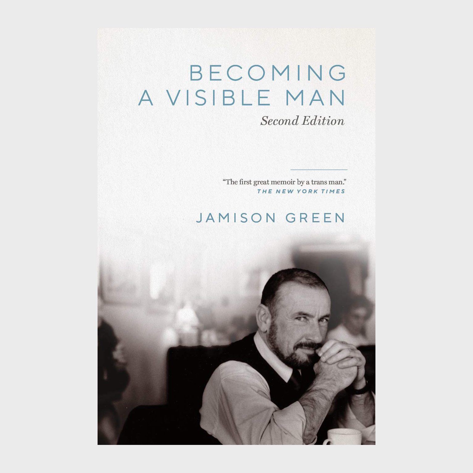 Book cover features a man sitting with clasped hands against a blurred indoor background. Title: "Becoming a Visible Man, Second Edition, Jamison Green."