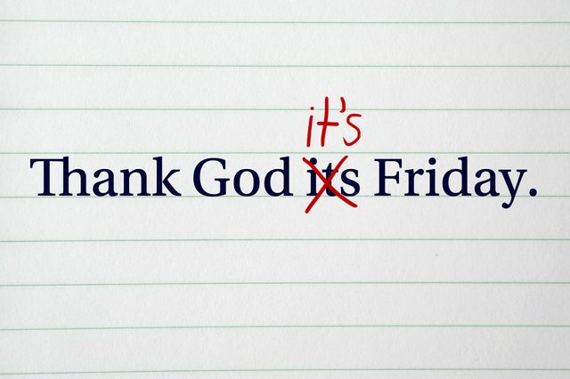 Text reads, "Thank God it's Friday," with "it's" corrected in red text and lines. Background shows lined paper.