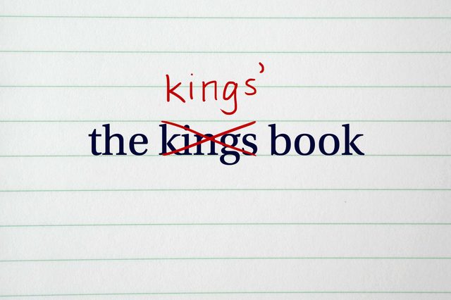 Text on lined paper. "The kings book" is corrected to "the kingâ€™s book" with red ink.
