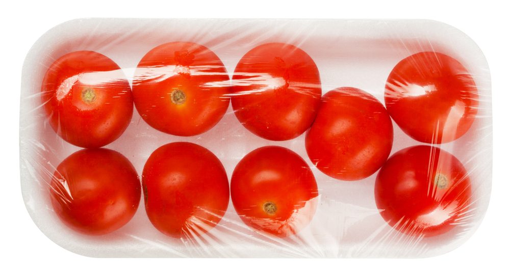 tomato in vacuum packing isolated on white background