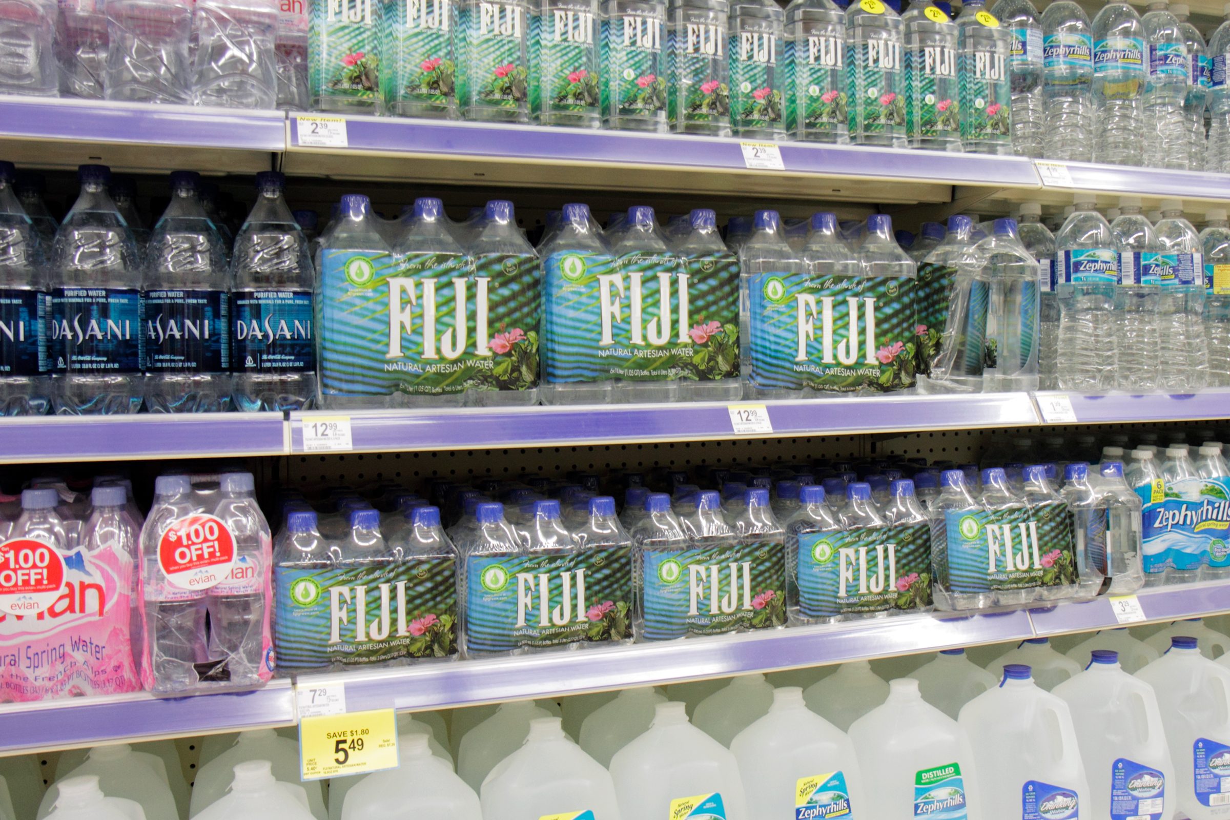 bottled water on a grocery store shelf