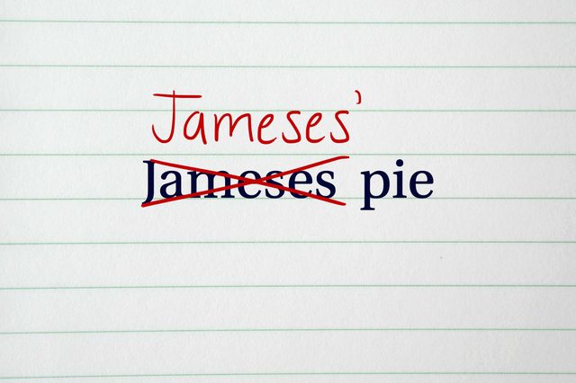 Text corrected using red ink on lined paper: "James' pie" replaces crossed-out "Jameses pie."