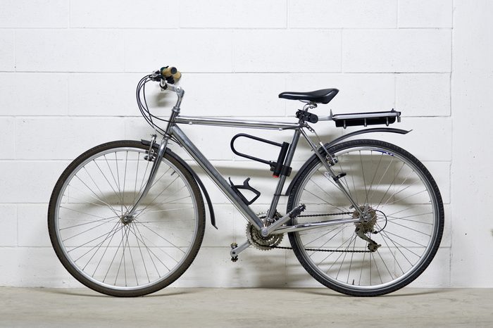 City bike over white wall.