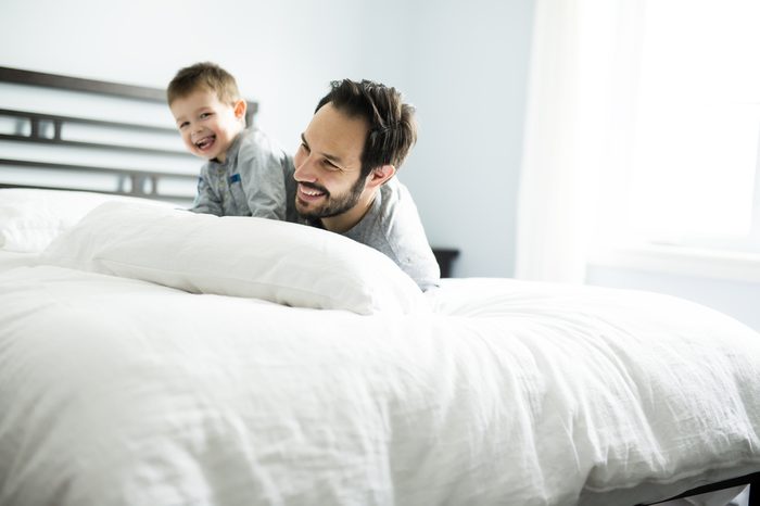 A Father and son in bed, happy time on bed