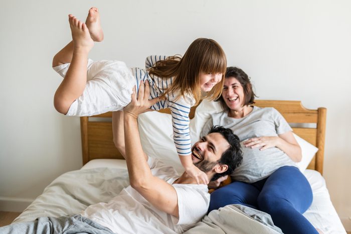 Pregnant family spending time together