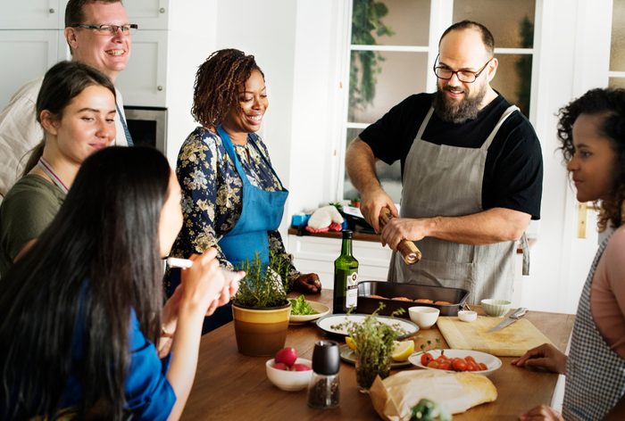 Diverse people joining cooking class