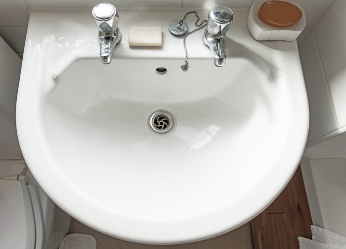 Sink, taps and soap bar from above