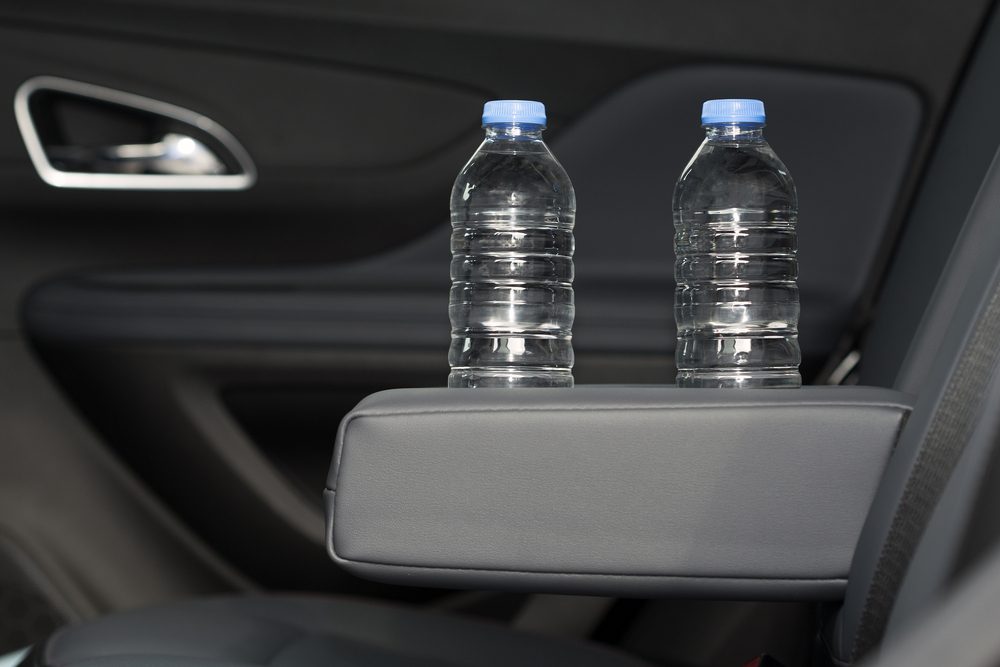 cup holder for water bottle, Modern Car Interior Top View. Black Leather Brand New Car Interior