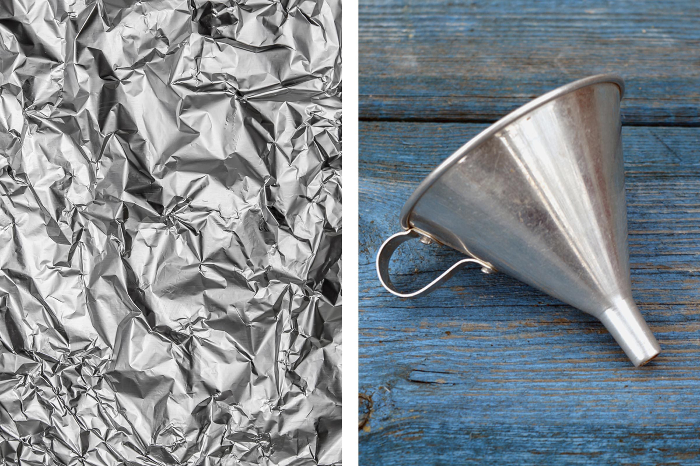 Aluminum foil texture next to old metal funnel