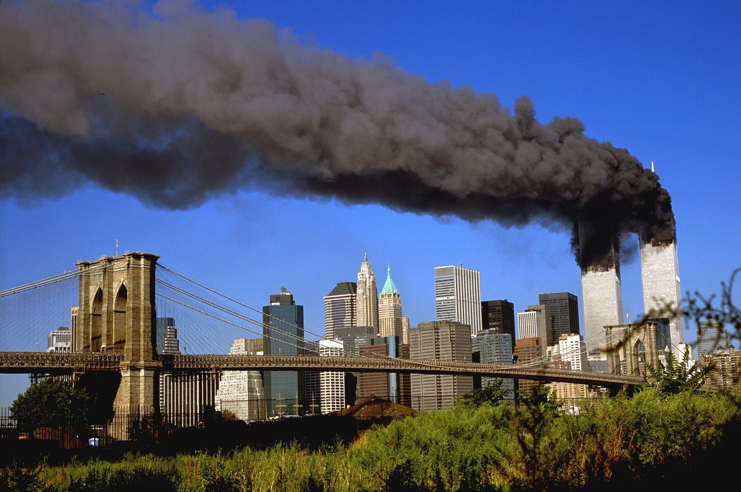 THE WORLD TRADE CENTER BURNING