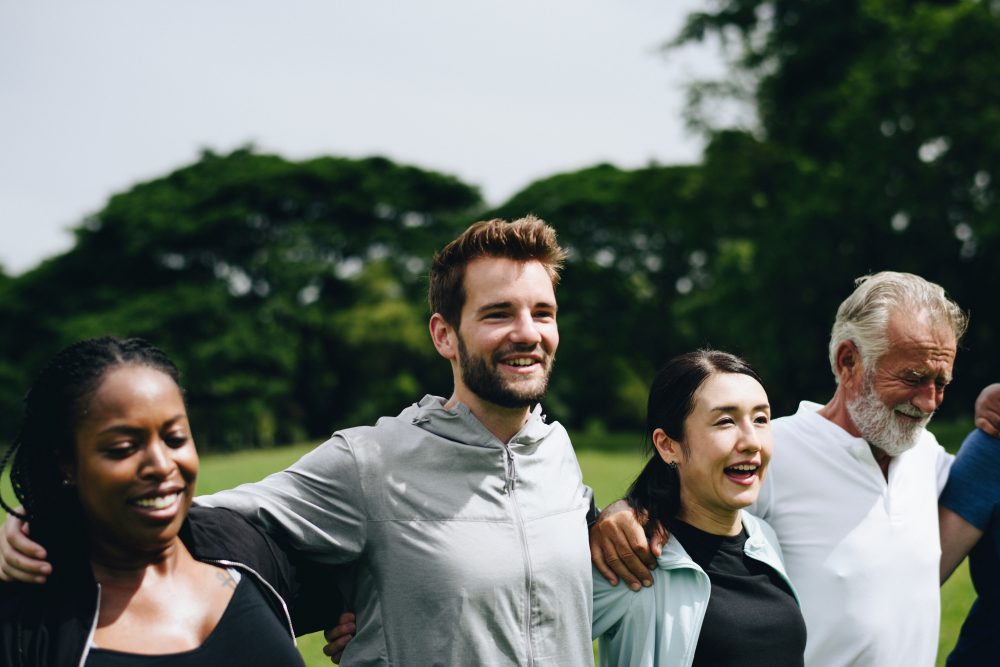 Happy diverse people together in the park