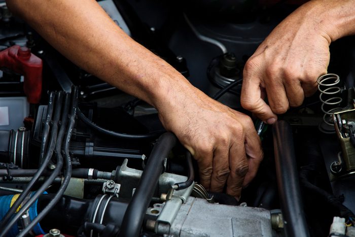 Professional car mechanic, auto repair concept.